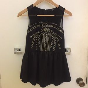 Cute black and gold top!